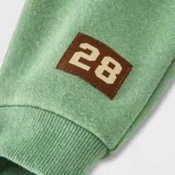 Baby Boys' Disney Mickey Mouse Solid Top And Bottom Set - Green/Tan -Disney GUEST a01bbe9a 83d1 4c7e 8095 8f05a8d6bc55